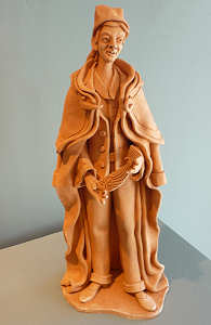 Homem de gab�o com peixe